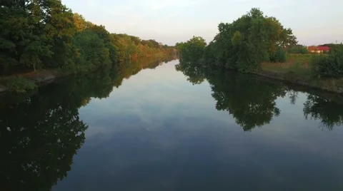 Fly over the river in the sunset light Stock Footage 67834821