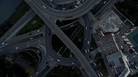 Fly over road interchange in city. Stock Footage 105809044