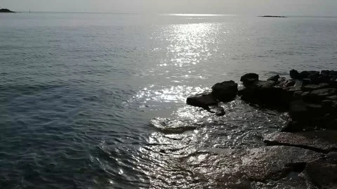 Fly over rocks to sea Stock Footage 106780616