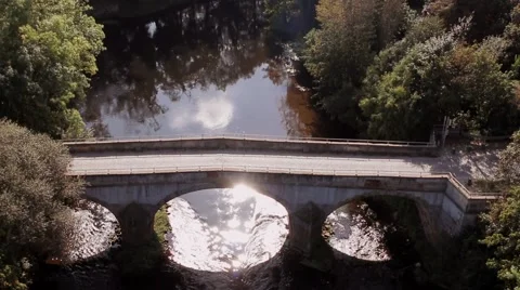 Fly over Romantic River and Bridge Stock Footage 41865113