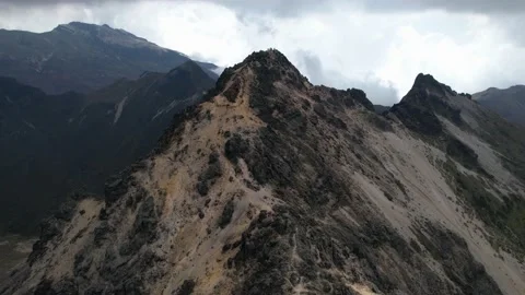 A fly over of a rugged volcano in Ecuador Stock Footage 158703780