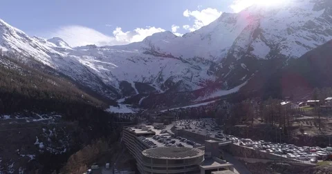 Fly over Saas Fee park house - Aerial 4K - 60s. Stock Footage 75157980