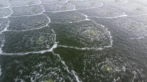 Fly over sewage pond Stock Footage 310573948