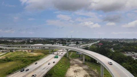 Fly-Over Shot of a Highway Junction in a Small Southern City Video stock 297040051
