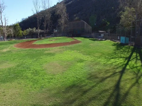 Fly over small baseball field Stock Footage 71479475