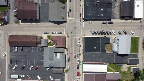 Fly over small town road 4k Stock Footage 158698396