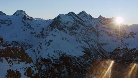 Fly Over Snow Mountain Range At Sunrise Sunset Ski Vacation Nature Religious Stock Footage 114654561
