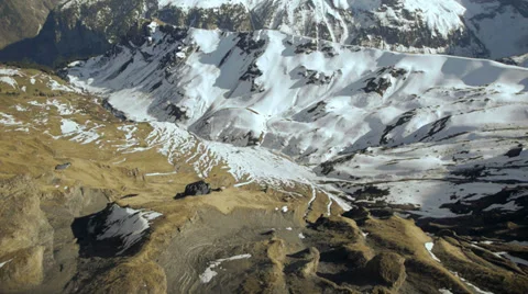 Fly over snowcapped mountain panorama. winter landscape. alps glaciers Stock Footage 38038095