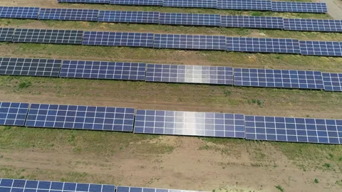 Fly over solar panels in summer Stock Footage 152958556