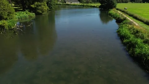 Fly over of a Still Lake Stock Footage 263099275