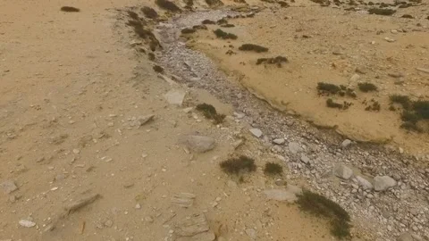 Fly over stony harsh plains and canyons of the Himalayas. Stock Footage 130345005