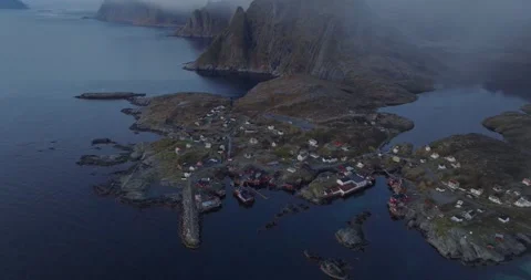 Fly over the storm rain snow in Å, village Lofoten Islands in Norway Stock Footage 260382413