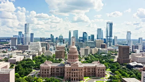 Fly over Texas State Capitol in Austin on a sunny day Stock Footage 344059138