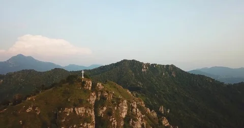 Fly over the top of the mountain with drone Stock Footage 79440305