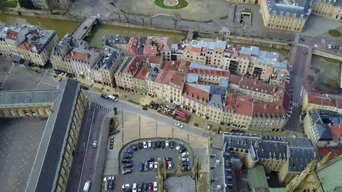 Fly over a town and pan up to horizon in France Stock Footage 74643323