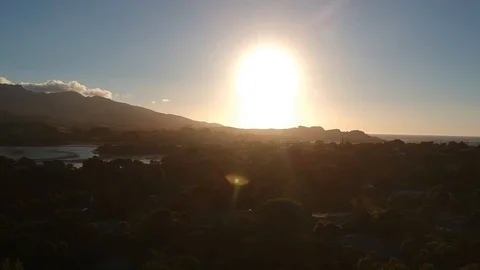 Fly over town mountain view day time Stock Footage 114485369