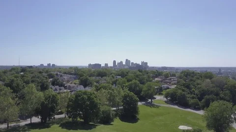 Fly-over Trees Towards Cityscape Video stock 76723702