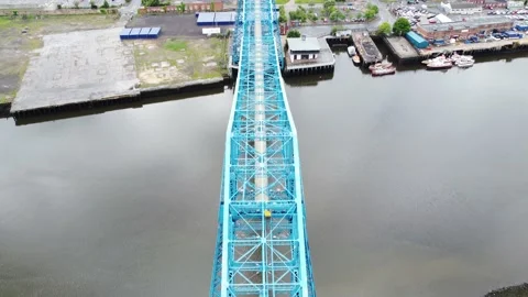 Fly Over View of River Tees Middlesbrough Transporter Bridge, Tees Dock Stock Footage 196110766