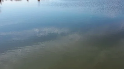 Fly over the water surface Stock Footage 126510993