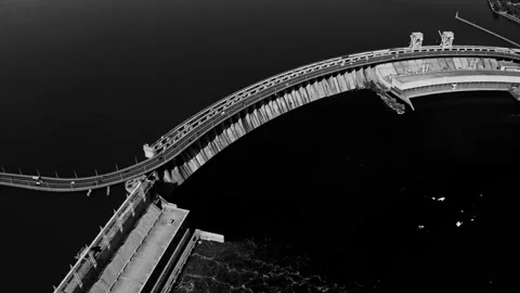 Fly over the weir and power lines of water-power plant. Aerial establishing shot Stock Footage 219894719