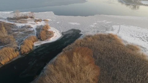 Fly Over Winter Lake Or River With Ice Floes. Stock Footage 123200630
