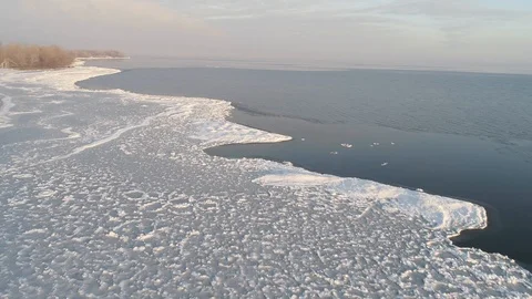 Fly Over Winter Lake Or River With Ice Floes. Stock Footage 123200677