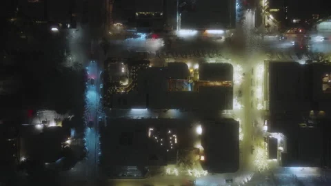 Fly over winter streets with night illumination. Street lights and town traffic 스톡 동영상 200232581