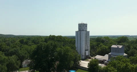 Fly past large silo tower structure midwest kansas Stock Footage 329779669