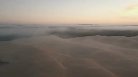 Fly on sand dune in foggy Stock Footage 150252564