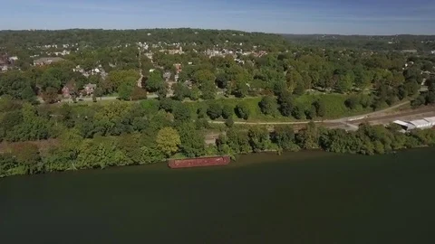 Fly by shot of Beaver, Pennsylvania featuring River Road in Western Pennsylvania Stock Footage 71273085