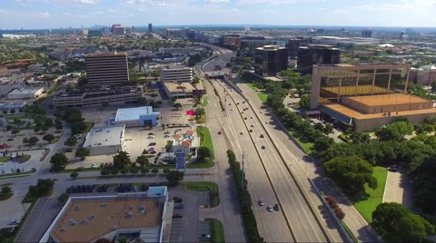 Fly Sideways Over Busy Highway And Buildings With Downtown View Stock Footage 65796780