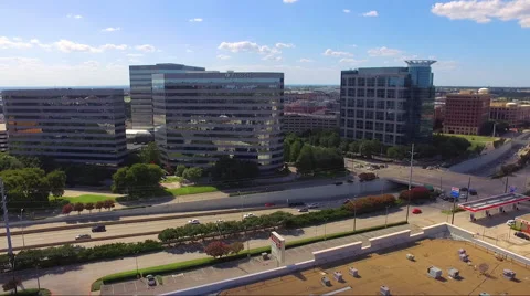 Fly Sideways Over Office Building And Highway Stock Footage 65796989