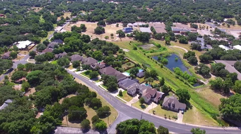 Fly Slow And Low Over Rural Neighborhood Stock Footage 65797717