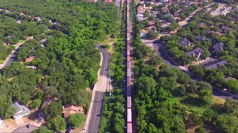 Fly Slow And Low Over Train And Trees Stock Footage 65798038