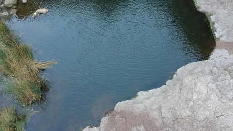 Fly Up Small Pond and Waterfall Aerial Stock Footage 82469207
