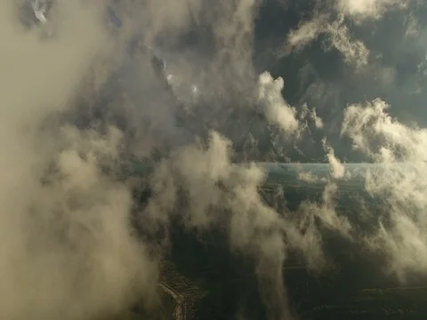 Fly through the clouds. Aerial drone smooth filming above puffy clouds. Stock Footage 71845534