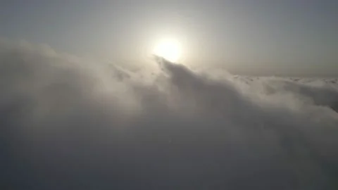 Fly through the clouds during sunrise. Stock Footage 158794343