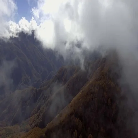 Fly through cloudy sky at Minami Alps Stock Footage 69408869