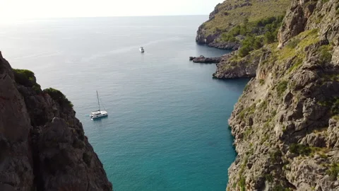 Fly-Through of Gorge from Beach to Sa Calobra Bay Stock Footage 280343062