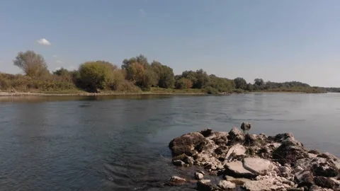 A fly through over river sava with stones Stock Footage 139159546