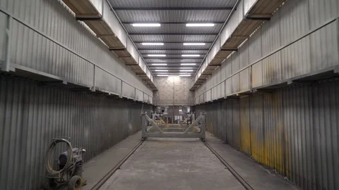 Fly through the sandblasting workshop. 4K Stock Footage 104656801