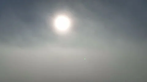 Fly up through thick cloud to clear sky with Sun above clouds. Aerial video Stock Footage 205591658