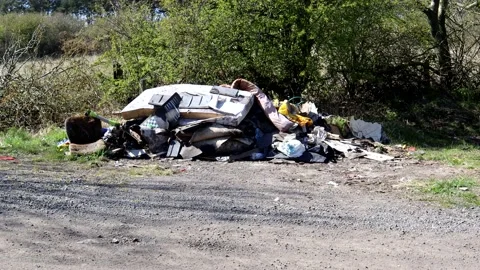 Fly Tip Illegal Dumping Stock-Footage 153214020