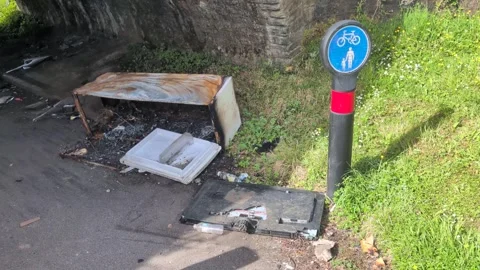 Fly Tipped Illegally Dumped Garbage Waste Obstructing Pathway in Wales, UK. Vídeos de archivo 336616977