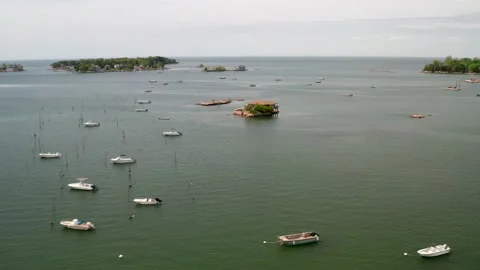 Fly toward small islands off the New England cost - approach drone shot Stock Footage 161264360