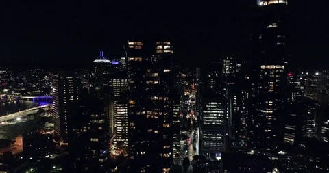 Fly towards building scyscraper aerial night Brisbane Stock Footage 99013183