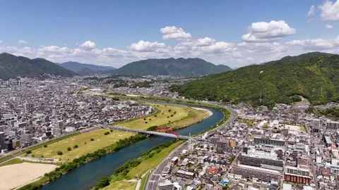 Fly towards Ota river in Hiroshima, Japan 库存影片 341375133