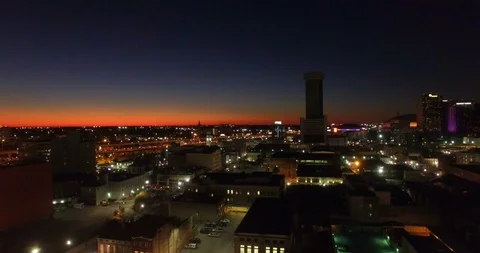 Fly towards sunset in warehouse district 動画素材 97077951