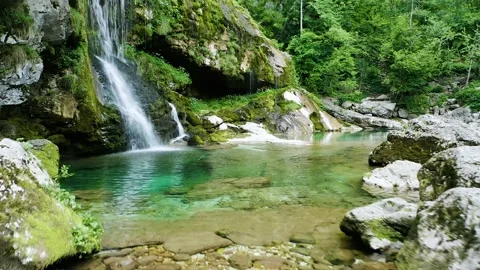 Fly Towards Virje Waterfall falling Into Charming Pool Of Green Emerge. Stock Footage 231202160