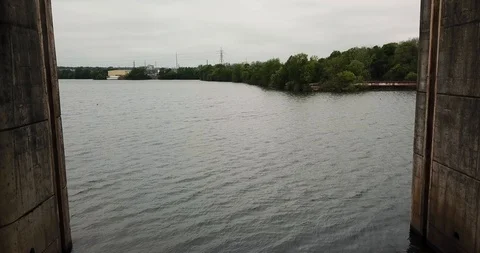 Fly Under Dam with Flood Gates Open Austin Texas Vídeos de archivo 96921882